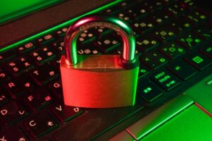 How to Choose a Live Webcam Room: 9 Quality and Safety Signals 1 Laptop with digital security symbol illustrating live webcam room privacy and safety